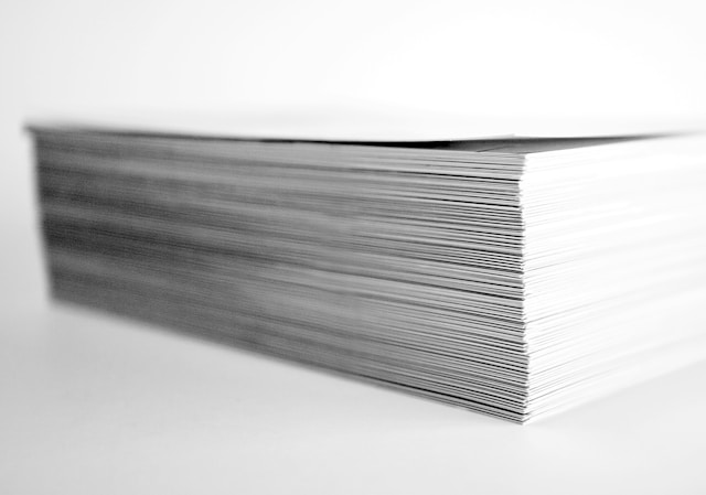 stack of papers on a desk