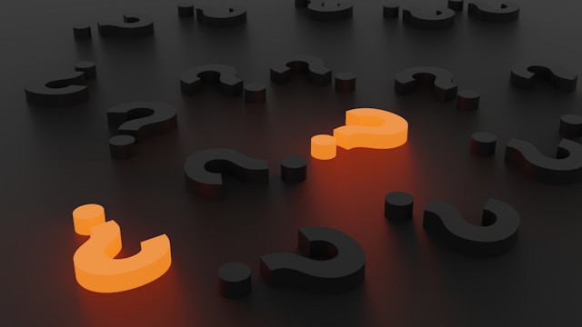 question marks on a surface